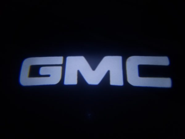 White GMC LED Courtesy Logo Lights - Lumenz 100944