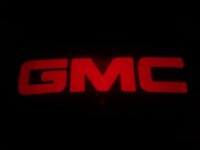 Red GMC LED Courtesy Logo Lights - Lumenz 100944