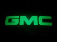 Green GMC LED Courtesy Logo Lights - Lumenz 100944